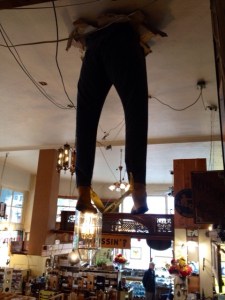 One more expression of Hippo Hardware. These legs are hanging out of the ceiling where you ascend steps to another level of the store.