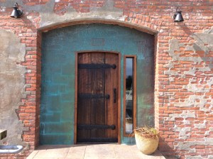 Doorways that inspire a photo in the U.S. are rare and that's sad. Port Townsend was an exception. This was my winning choice by far and when I showed it to Bonnie she said, "Where is that!! I want it printed for my wall!" The home itself was unusual, right on the water and likely having a past life in some type of commercial maritime use. A sign nearby said it was a private home but there was a wrap-around boardwalk without any gates so it seemed the public was free to walk around for the views. The following photos are other doors on the non-water side of the house.